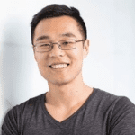 Dr Xiao (Tommy) Liu smiles to camera.