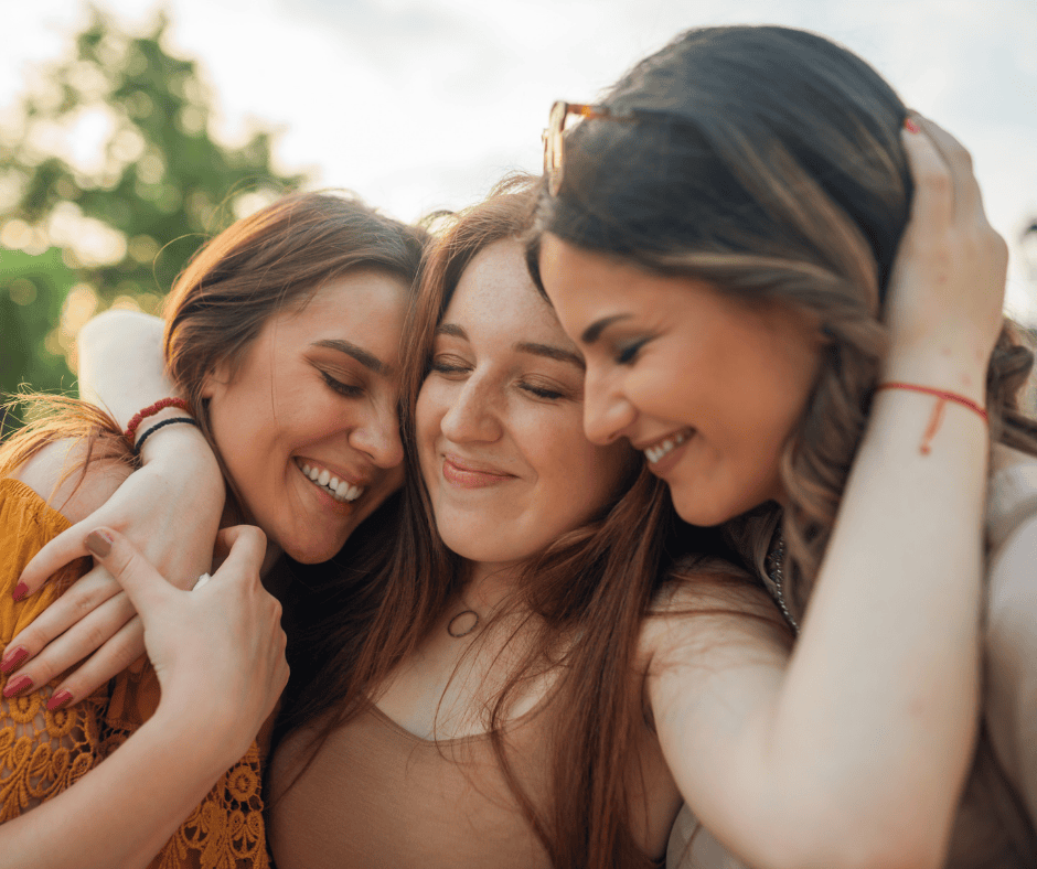 Three Young Women Hugging