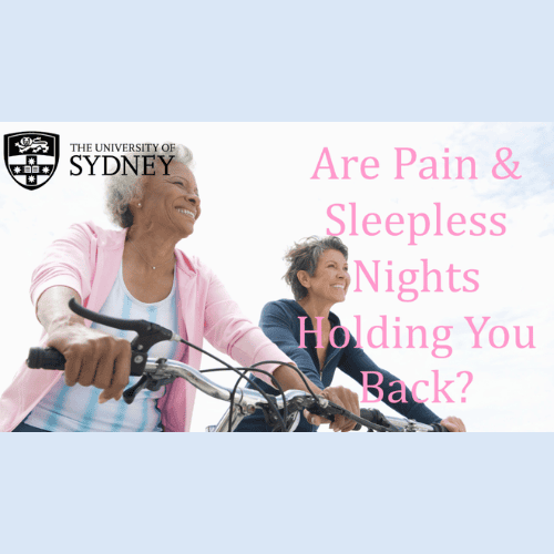 Two women riding bikes side-by-side